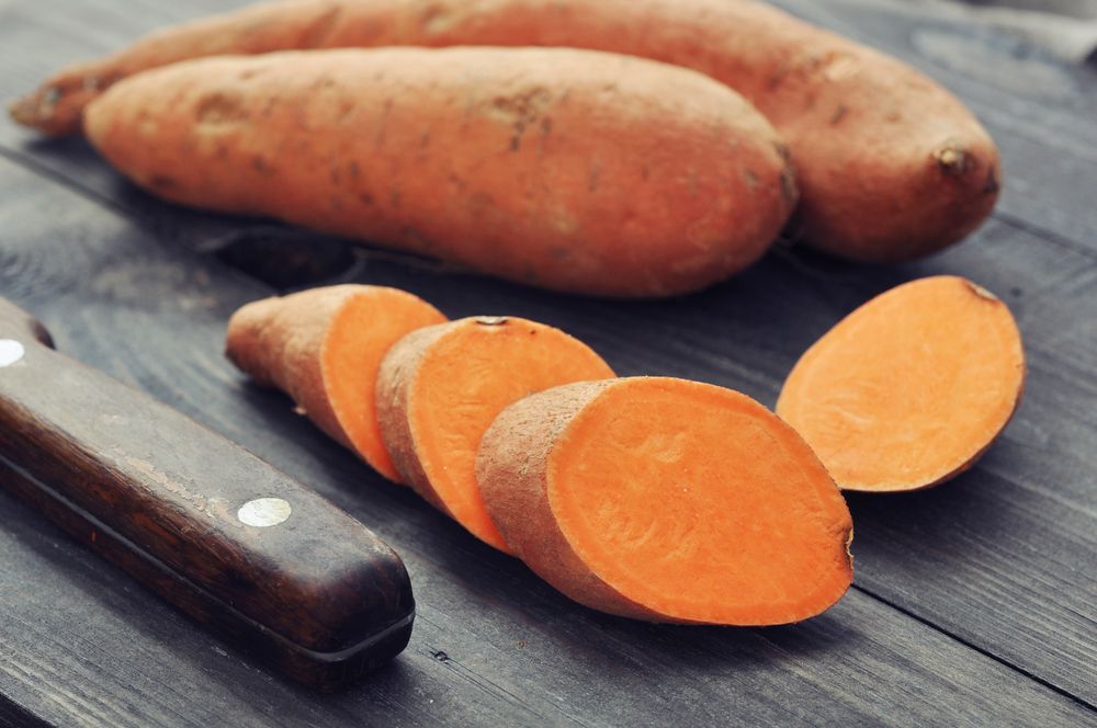 Sweet potatoes come in different varieties like this sweet, orange-colored root crop.